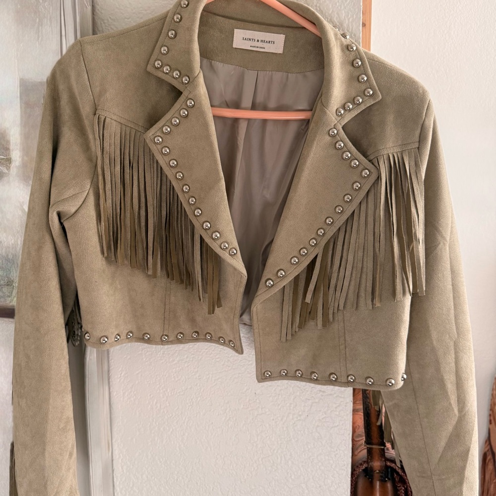 Sleek Leather Jacket with Fringe and Studs